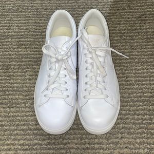 White, Nike low-top blazers.